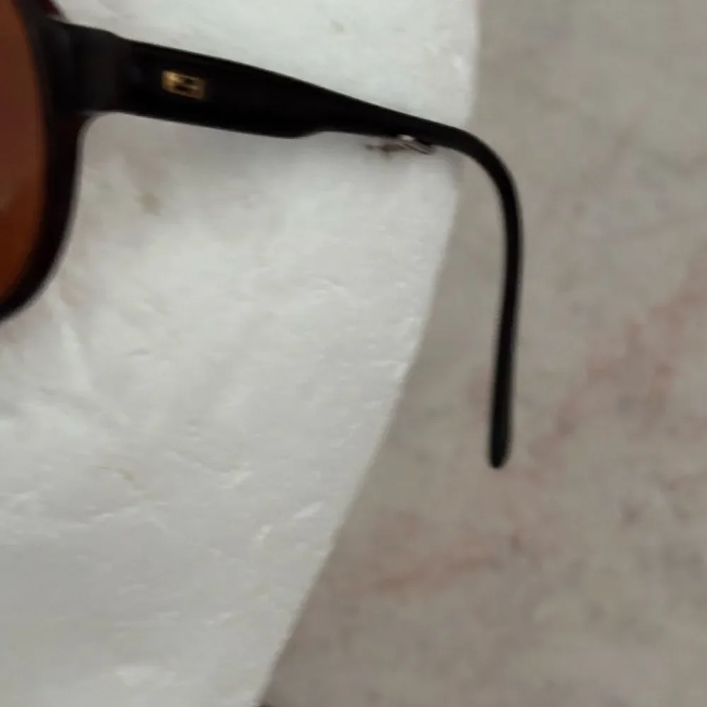 Safilo glasses brown gold frame cutout front sunglasses accessory eyewear